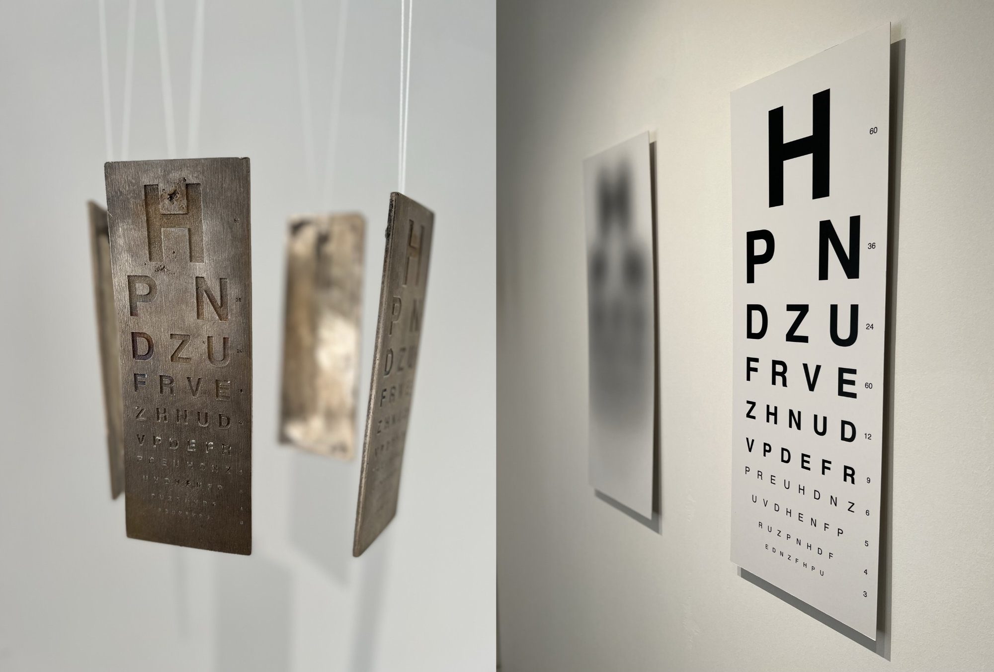 The rightmost image shows two white Snellen charts used by opticians. They are aligned side by side. The chart on the left hand side shows distorted and blurred shapes which are assumed to be the blurred letters of the chart. Whilst the second chart on the right hand side shows the lettering perfectly crisp and clean. In the leftmost image, a 4-piece metallic mobile is shown with engraved Snellen charts hanging from the ceiling.